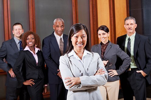 Three male and three female business people, all dressed nicely, smiling, facing front, all are job seekers