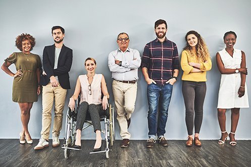 7 employees of various sex, race, ability, culture, orientation, age, representing an inclusive workforce