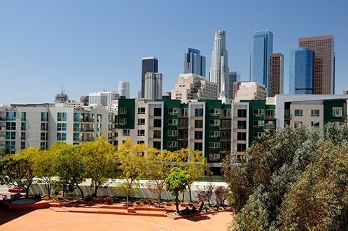 Beautiful apartments in front of the city skyline for Los Angeles