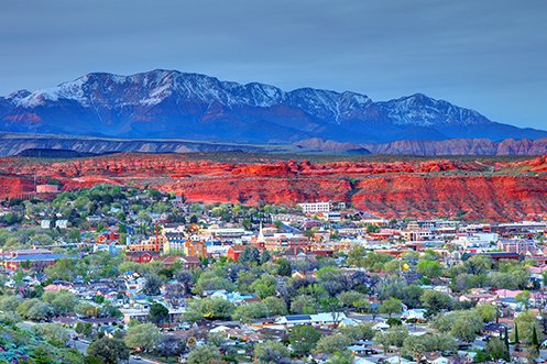 Some U.S. cities add jobs at the highest rates, and the St. George Utah city skyline and surrounding canyons is at the top of one of these lists