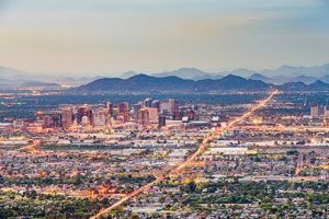 Phoenix Arizona city skyline at dusk, showing a beautiful city destination for companies considering a 2020 Phoenix Relocation
