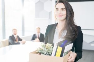 young professional woman resigning from job