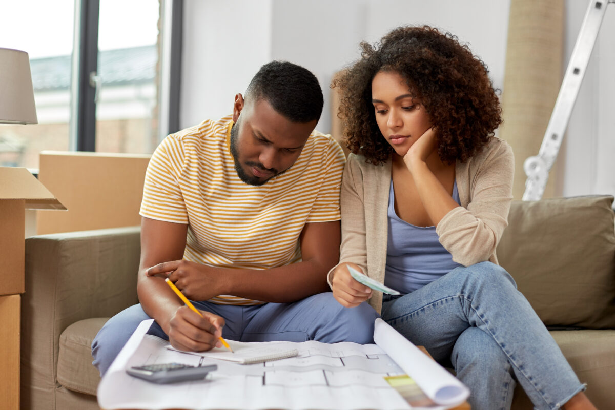 young African-American couple reviewing their finances