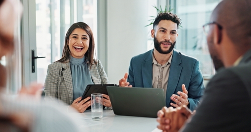 Corporate mobility team going over rental market and destination services report.