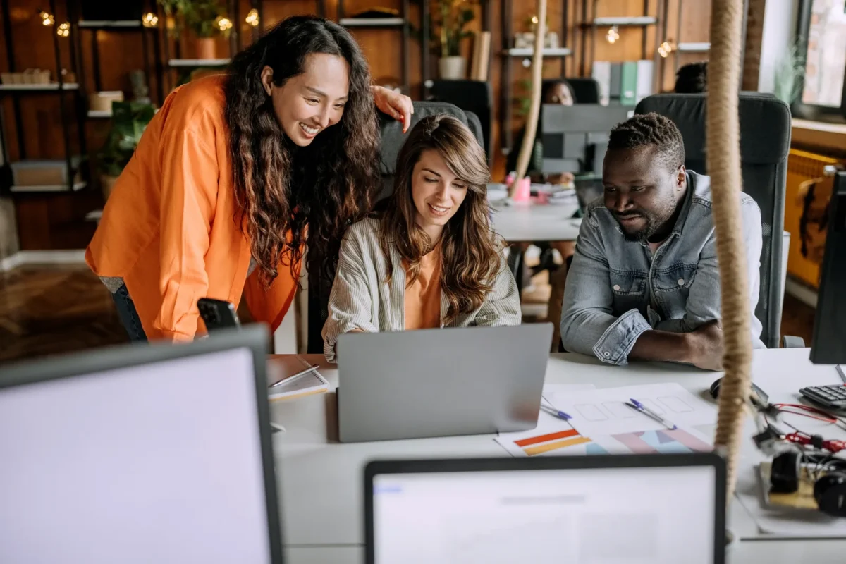 team members in an office, working well together