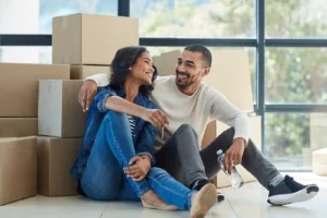 young African American couple happy to move into their new home