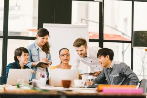 business team mixed with Americans and Chinese working well together